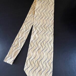 Bill Blass Gold Tie with Blue Wave Design